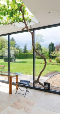 Tri-sliding doors by Alpha Home Improvements